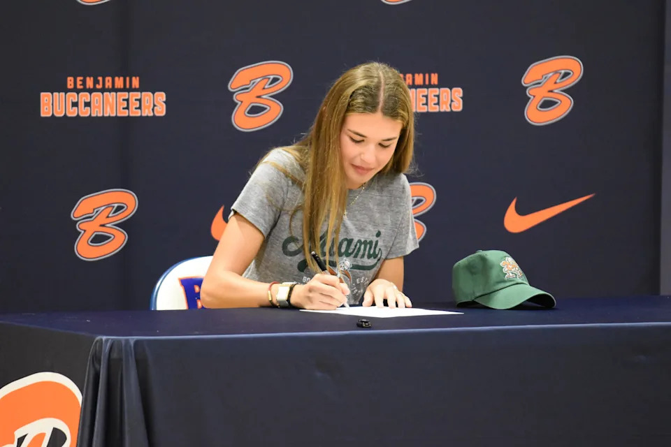 Benjamin's Kai Trump puts pen to paper, signing with the University of Miami women's golf during the Buccaneers' fall signing ceremony on Nov. 7, 2025.