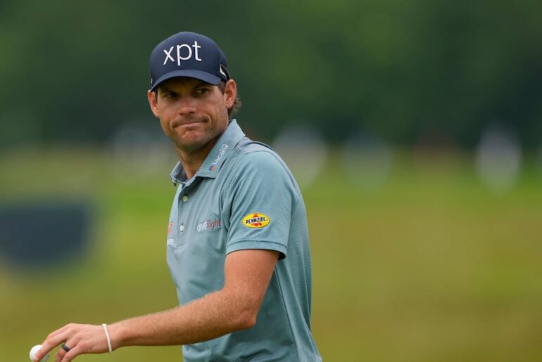 Adam Schenk survives a raging wind in Bermuda to win first PGA Tour title in 243rd attempt