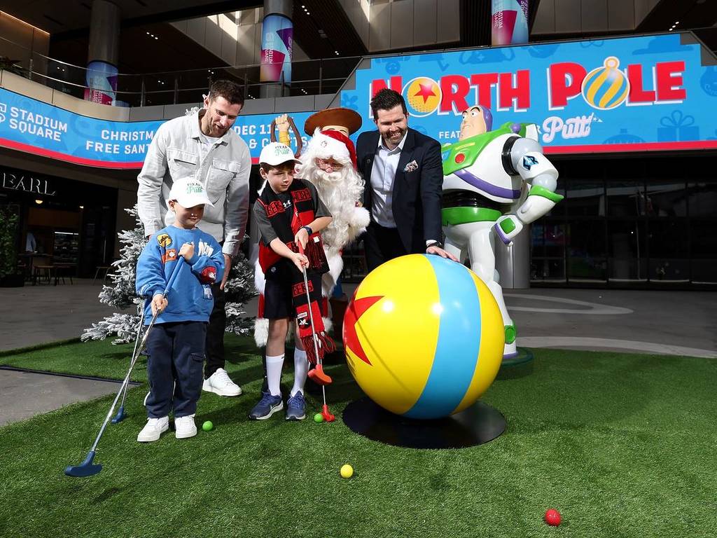 children playing mini golf at Marvel Stadium