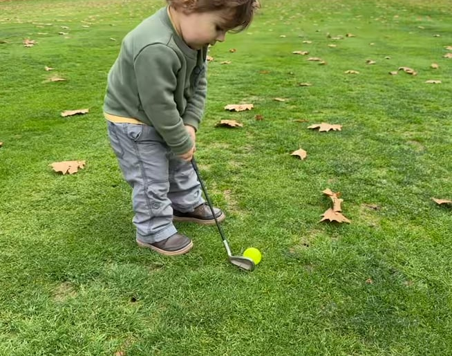 15 month old loves to golf.