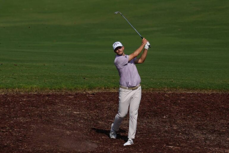 Hojgaard leads World Tour Championship with McIlroy in pursuit