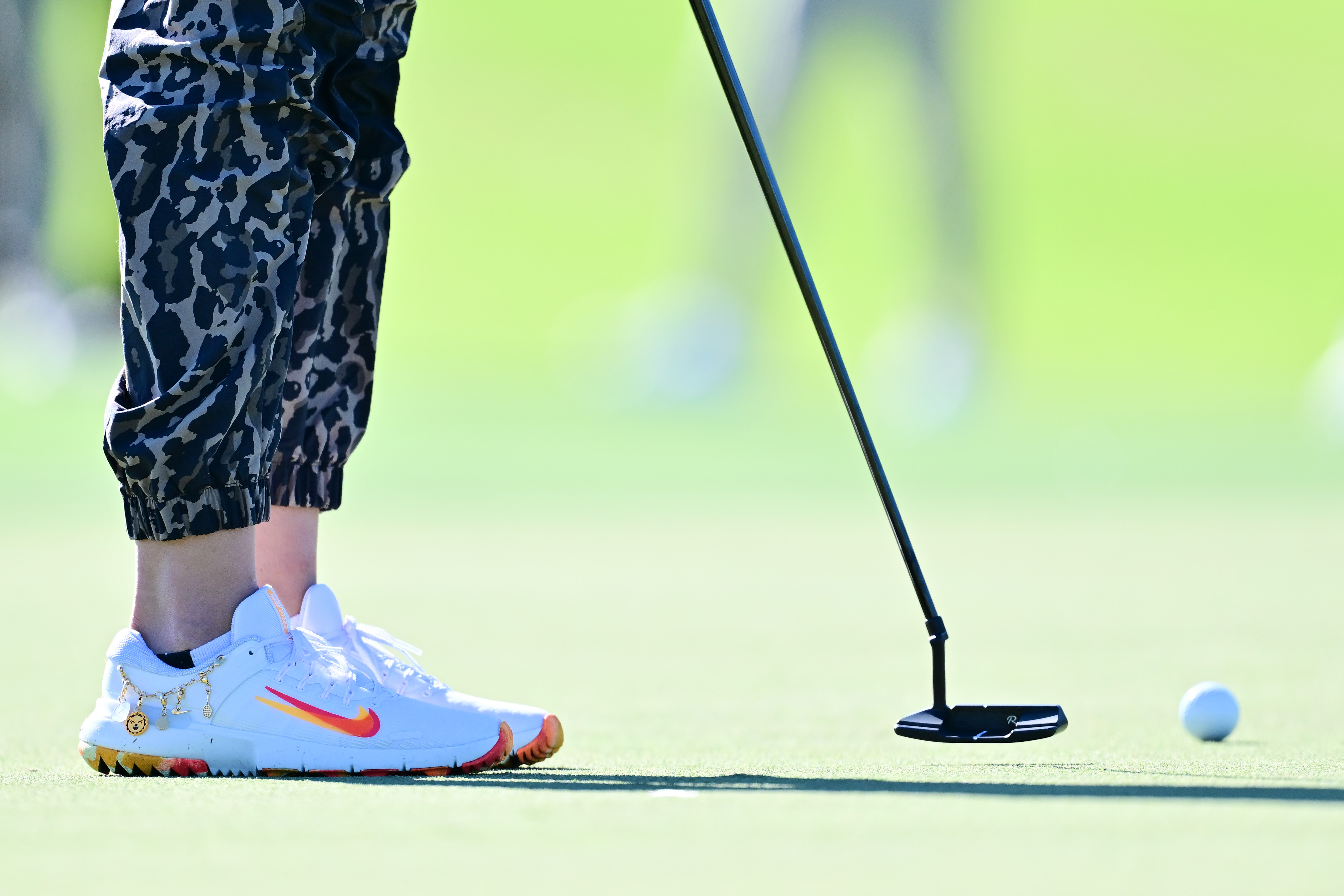 A close-up of Nelly Korda's golf shoes