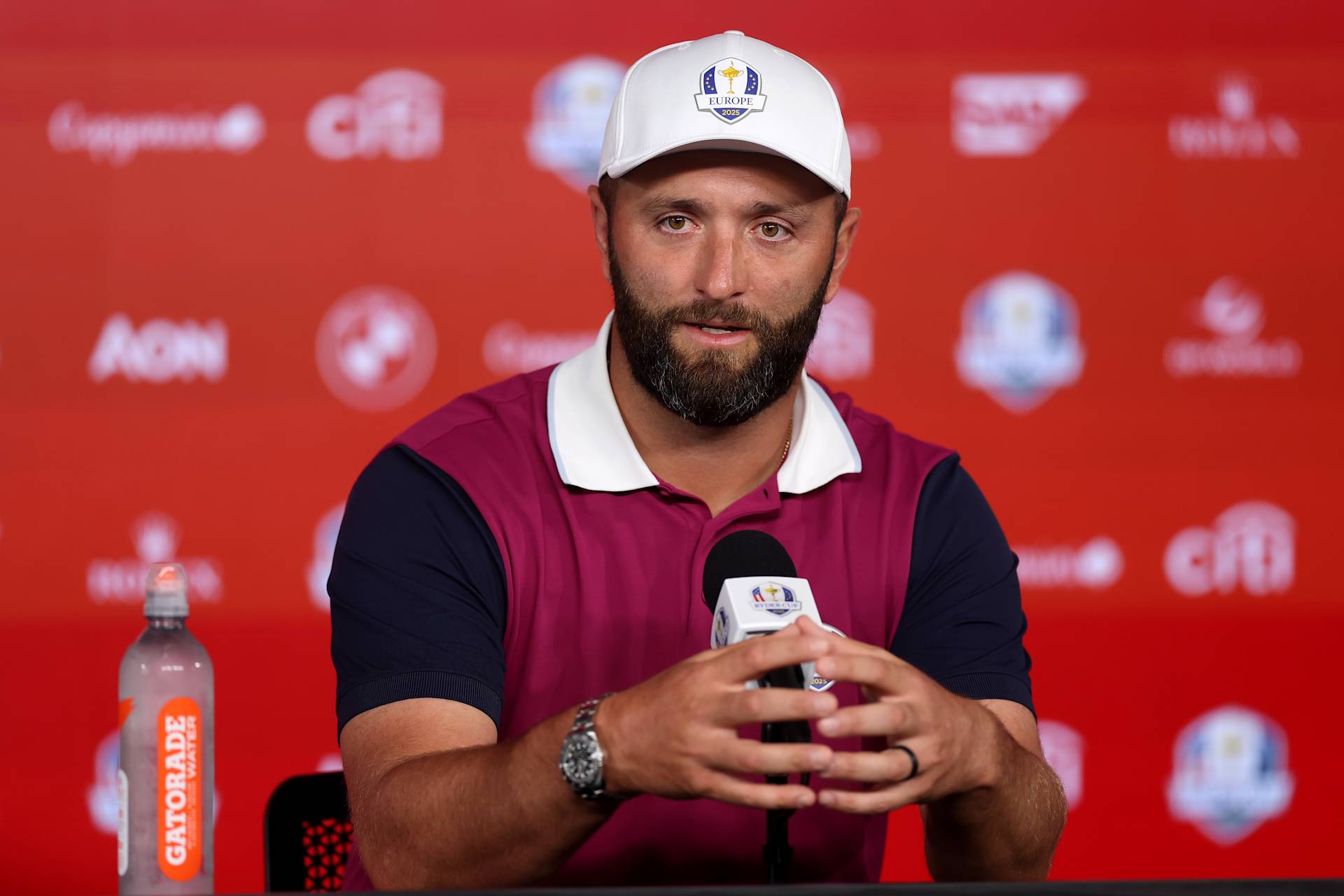FARMINGDALE, NEW YORK - SEPTEMBER 25: Jon Rahm of Team Europe talks with reporters prior to the Ryder Cup 2025 at Black Course at Bethpage State Park Golf Course on September 25, 2025 in Farmingdale, New York. (Photo by Carl Recine/Getty Images)