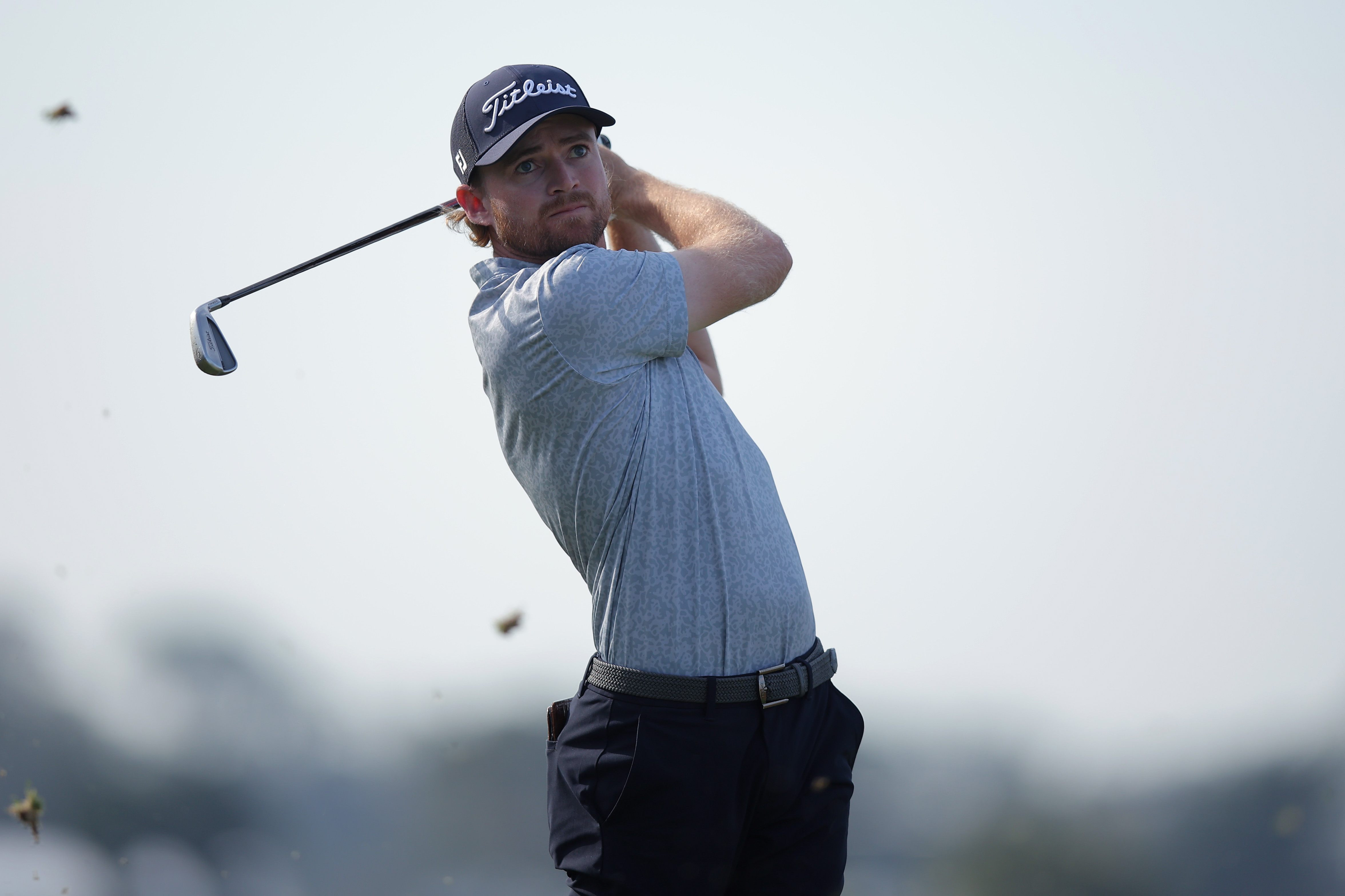 Danny Walker hits an iron shot