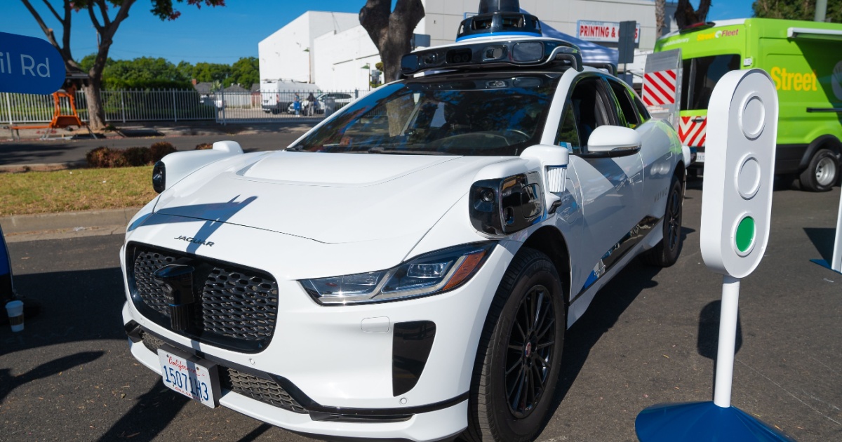 Waymo Vehicle Spotting Driving Over A Golf Course, But Dont Worry, Its Not Actually A Malfunction Waymo car