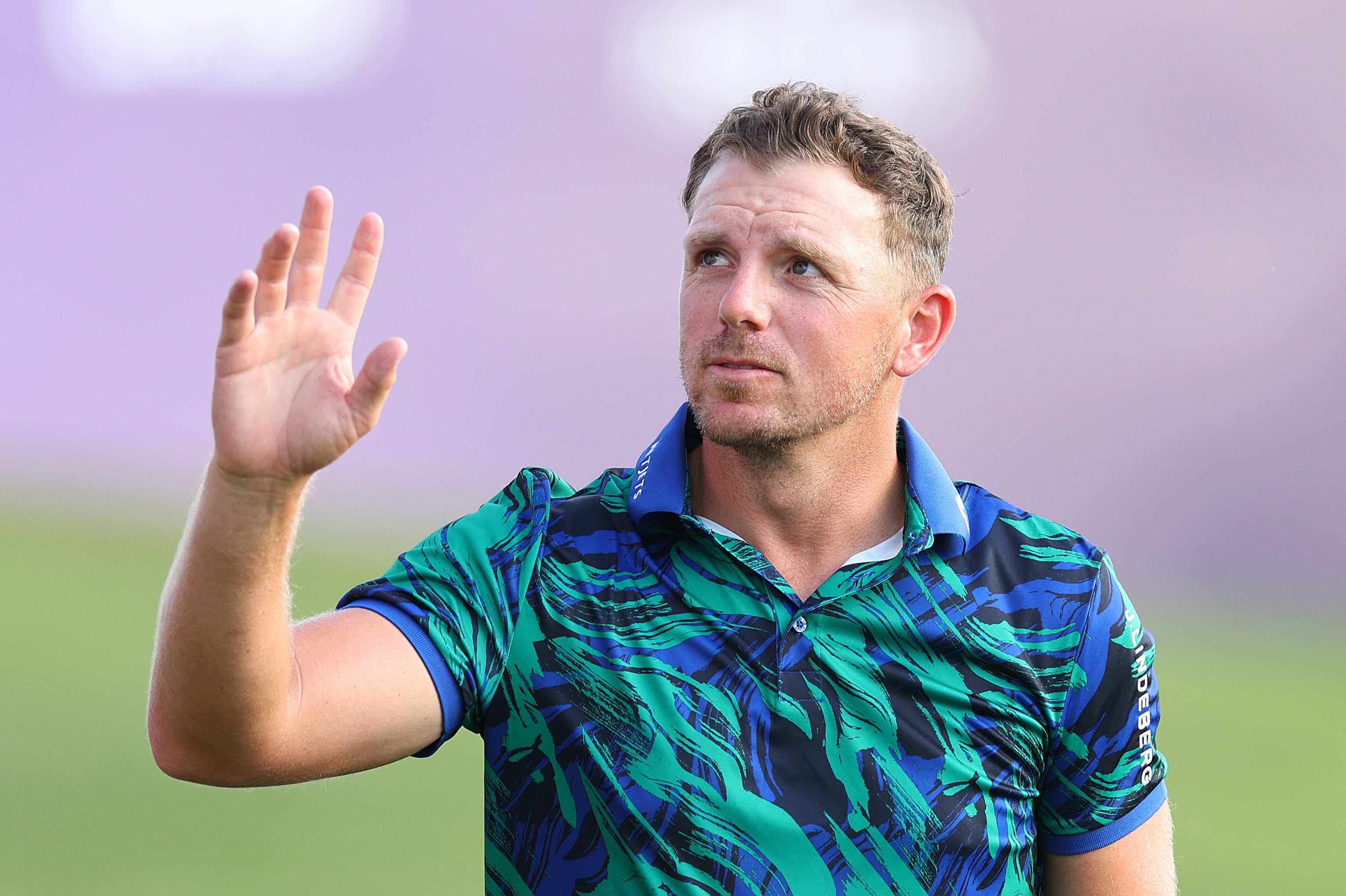 Matt Wallace thanks the crowd after finishing his third round at the DP World Tour Championship in Dubai