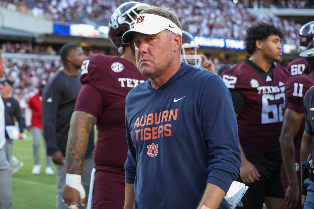 Auburn Tigers head coach Hugh Freeze walks off the field.