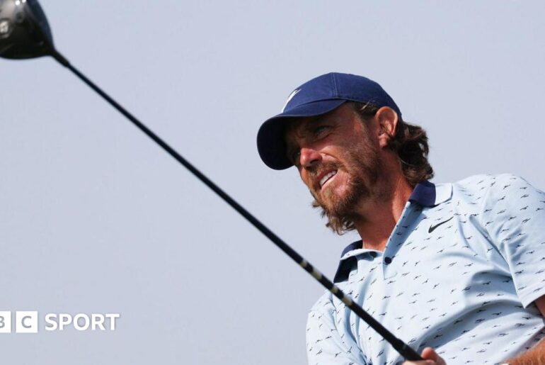 Tommy Fleetwood watches a shot