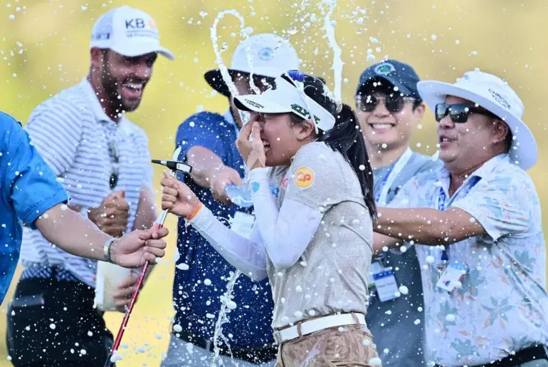 Jeeno Thitikul of Thailand is sprayed with champagne after her winning putt on the 18th green during the final round of the LPGA Tour Championship.