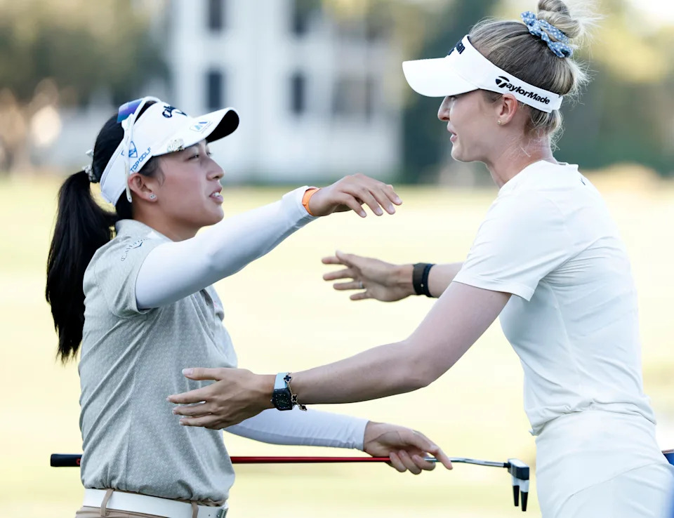 Jeeno Thitikul of Thailand hugs Nelly Korda of the United States after her round on the 18th hole during the final round of the CME Group Tour Championship 2025 at Tiburon Golf Club on November 23, 2025 in Naples, Florida.