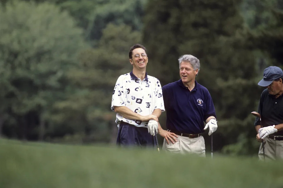 Golf writer Rick Reilly (L) has played golf with a United States president in Bill Clinton, in 1995. / Jacqueline Duvoisin / Jacqueline Duvoisin /Sports Illustrated via Getty Images
