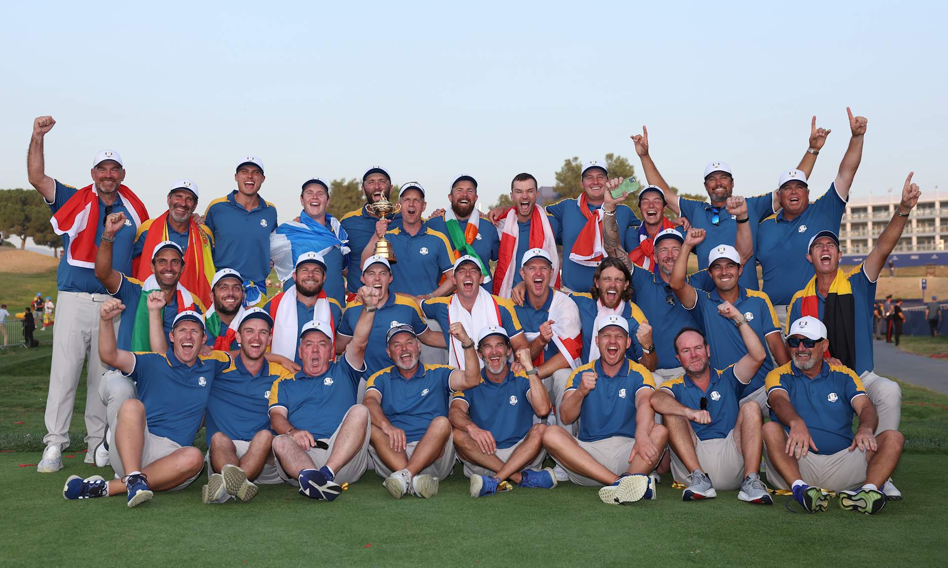 ROME, ITALY - OCTOBER 01: The players, caddies, vice-captains and Captain Luke Donald of Team Europe celebrate with the trophy after the Sunday singles matches of the 2023 Ryder Cup at Marco Simone Golf Club on October 01, 2023 in Rome, Italy. (Photo by Richard Heathcote/Getty Images)