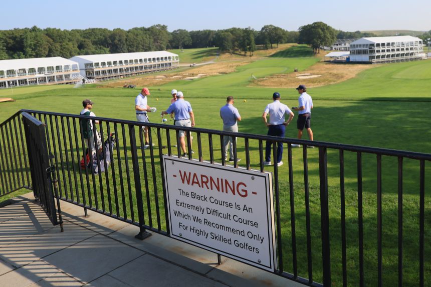 Golfers play at Bethpage State Park Golf Course during construction on August 11, in Farmingdale, New York.
