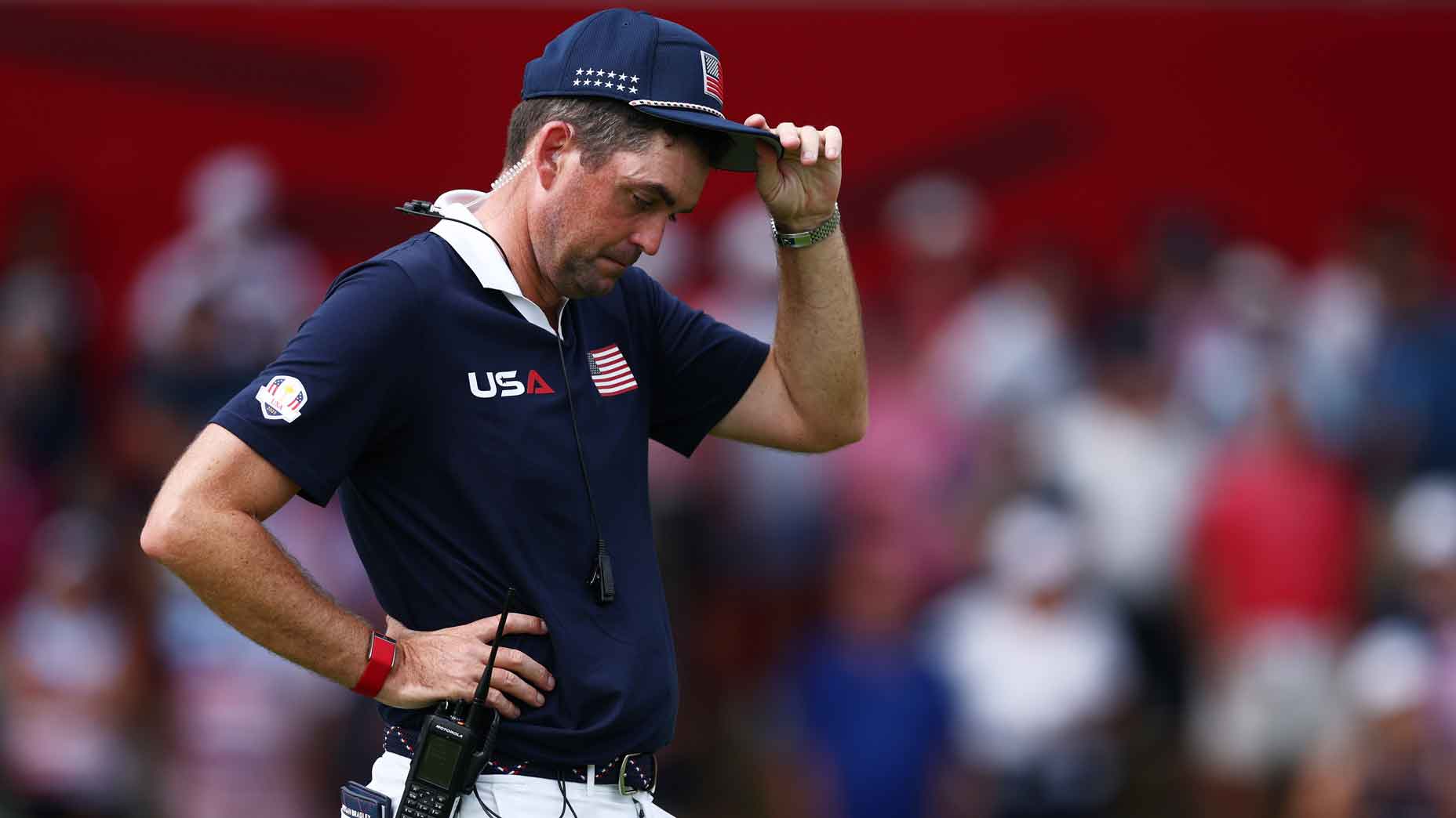 keegan bradley takes off his hat during the 2025 ryder cup