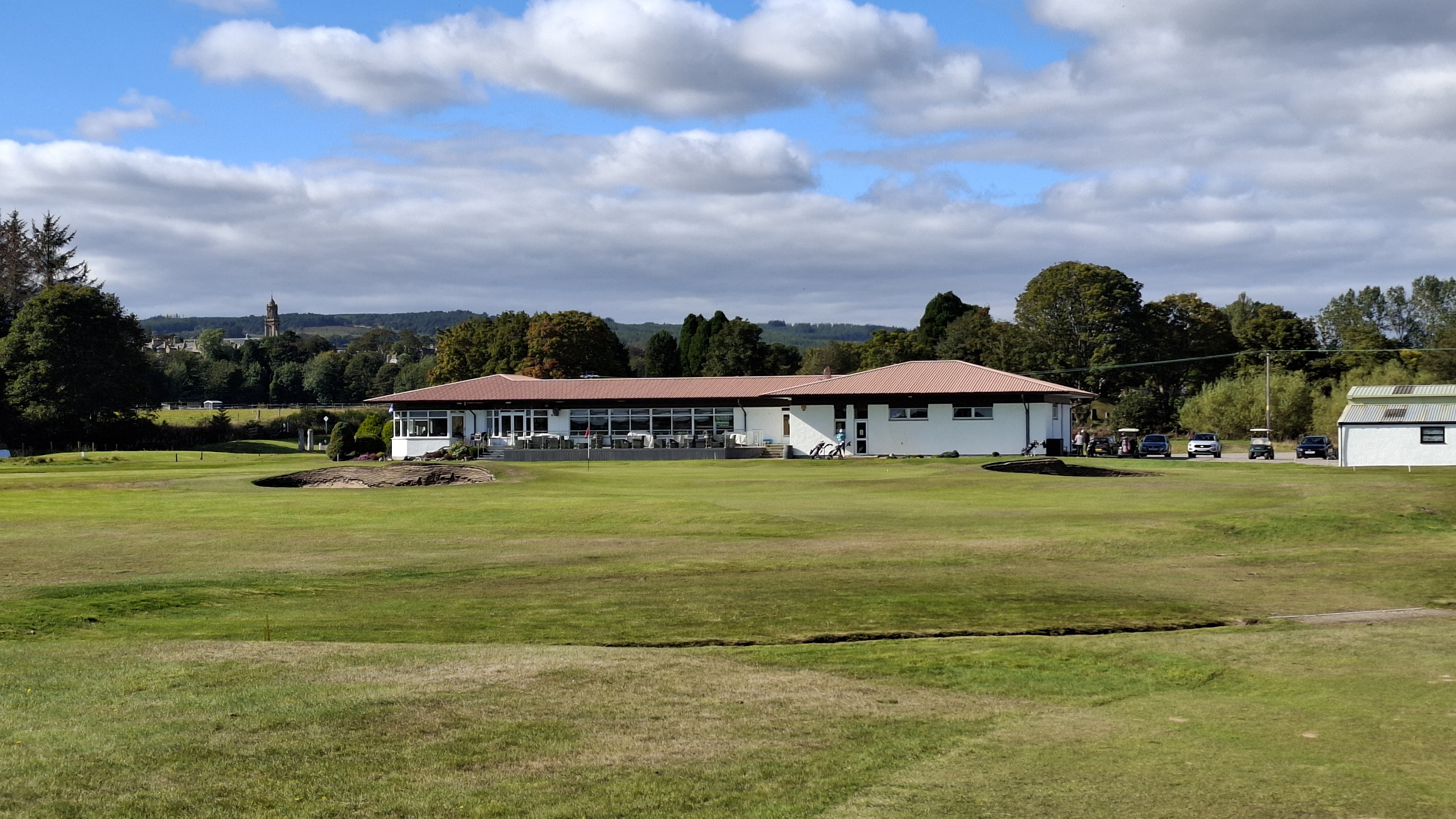 The 18th hole and clubhouse at Tain