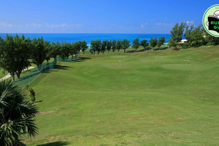 Is batting away range balls on the course considered practice?