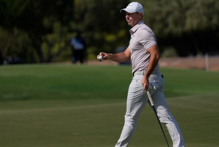 McIlroy emerges with share of lead after wild third round at European tour finale