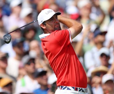 Scottie Scheffler plays a shot in during the men's golf tournament at the 2024 Olympics