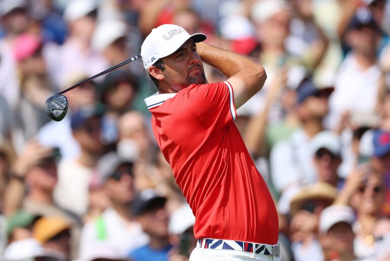 Scottie Scheffler plays a shot in during the men's golf tournament at the 2024 Olympics
