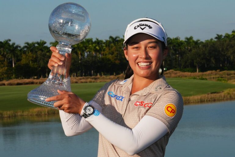 Jeeno Thitikul of Thailand holds the CME Global Trophy after winning the LPGA Tour Championship