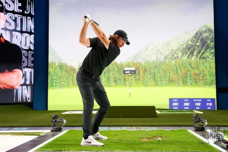 Tommy Fleetwood swings during a TGL match between Boston Common and Los Angeles Golf Club