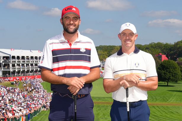 Scottie Scheffler and Rory McIlroy pose for a picture on the first tee at the Ryder Cup