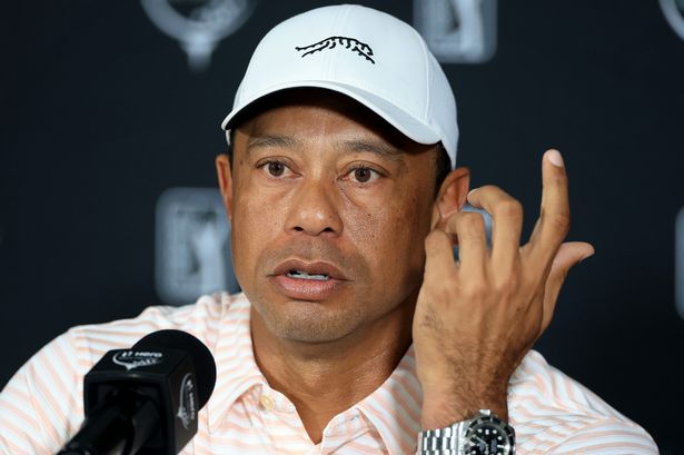 Tiger Woods leaves comment for Scottie Scheffler on a shot during Hero World Challenge