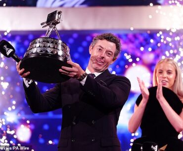 Rory McIlroy lifts the SPOTY gong, presented to him by 2024 winner Keely Hodgkinson