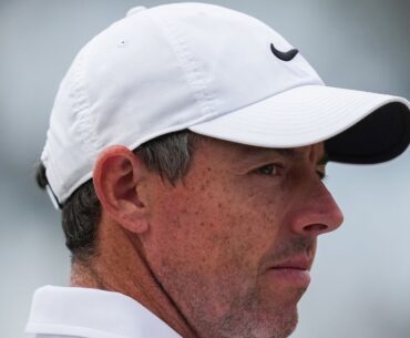 Rory McIlroy's late birdie burst means he'll be playing on the weekend at the Australian Open