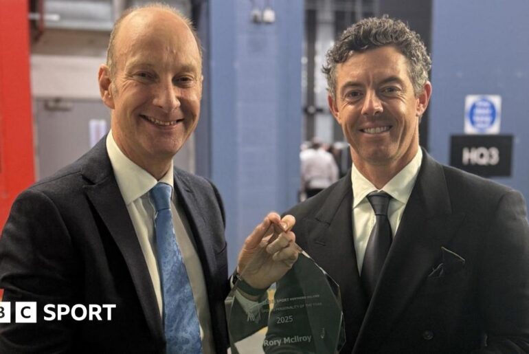 Stephen Watson presents the BBC NI Sports Personality of the Year award to Rory McIlroy