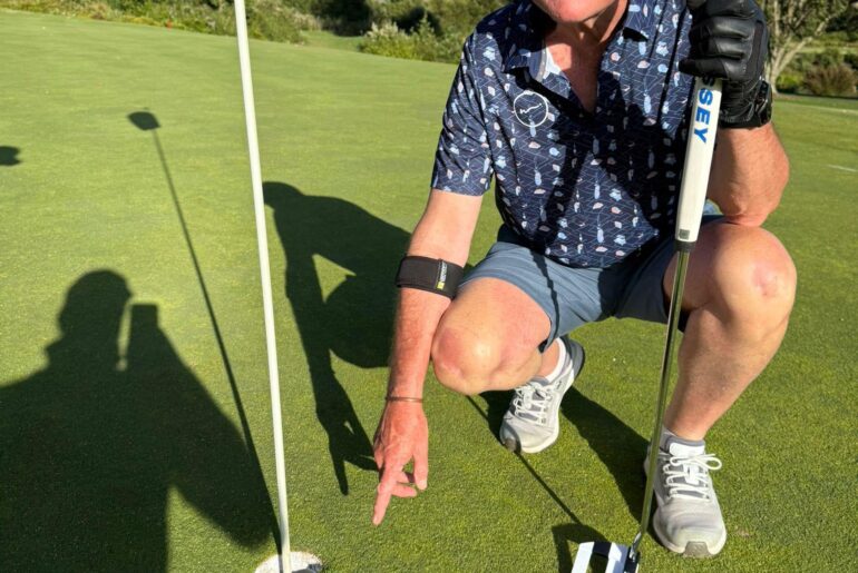 My dad almost slam dunked it on a par 3