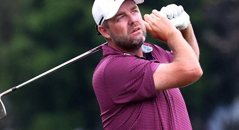 Marc Leishman has overcome blustery conditions to win the Victorian PGA Championship. Photo: AAP PHOTOS
