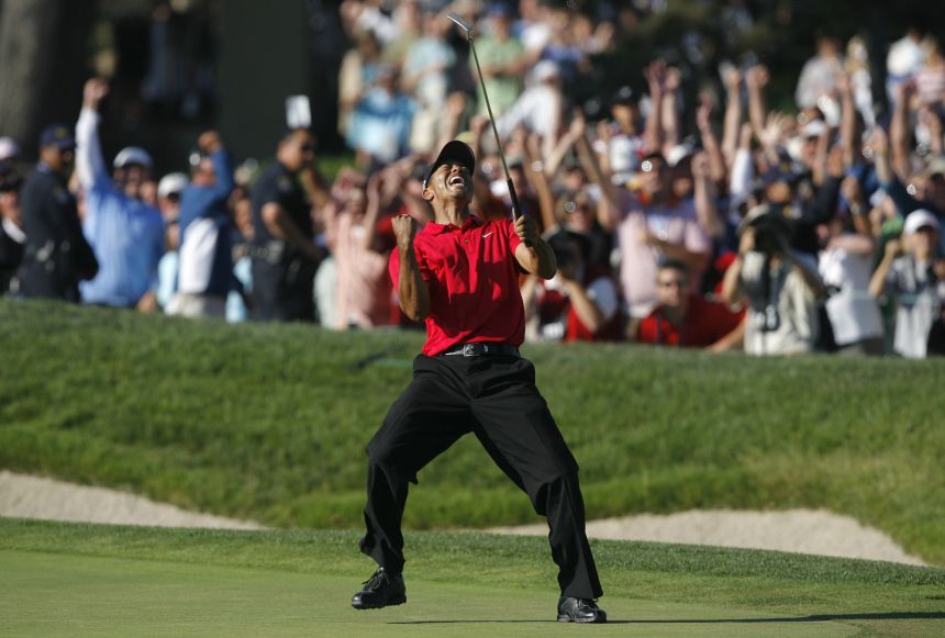 Woods celebrates after making a birdie on the 18th hole to force a playoff at the 2008 US Open.