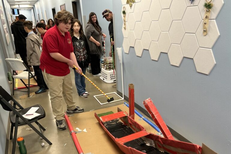 ASK Academy students showcase mini-golf exhibits