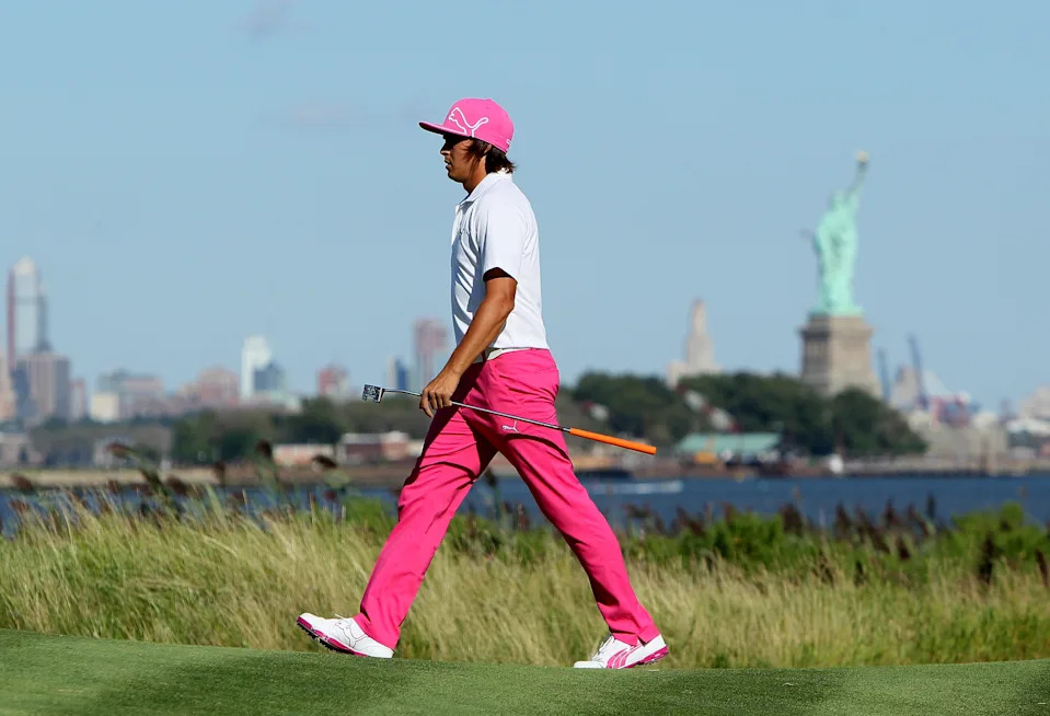 Rickie Fowler walks to the 14th green during the third round of The Barclays at Liberty National Golf Club on August 24, 2013 in Jersey City, New Jersey.