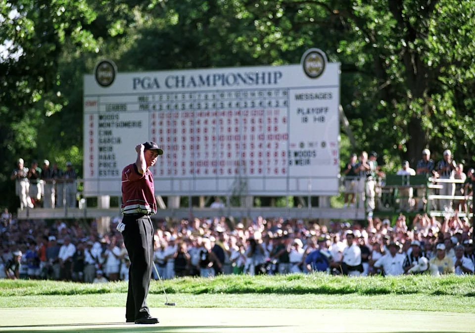 15 Aug 1999: Tiger Woods celebrates as he makes the winning putt during the PGA Championships at the Medinah Country Club in Medinah, Illinois. Mandatory Credit: Harry How /Allsport
