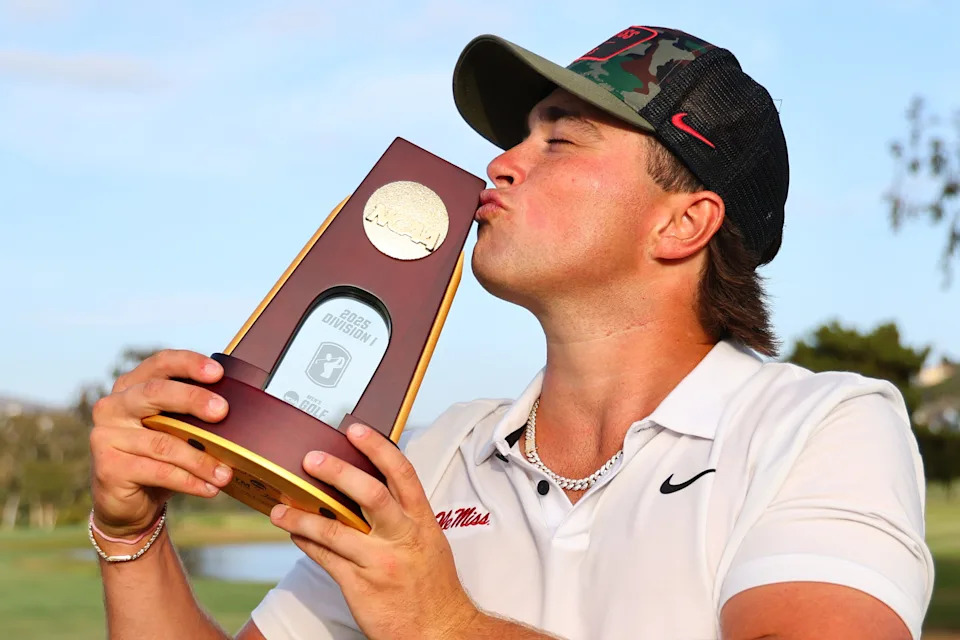 Michael La Sasso of the University of Mississippi poses with the champion trophy on the 18th hole during the 2025 NCAA Division I Men's Golf Championship at Omni La Costa Resort & Spa on May 26, 2025 in Carlsbad, California.