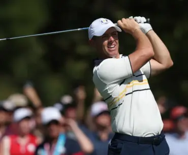 Golf - The 2025 Ryder Cup - Bethpage Black Golf Course, Farmingdale, New York, United States - September 28, 2025 Team Europe's Rory McIlroy hits his tee shot on the 3rd hole during the singles REUTERS/Paul Childs