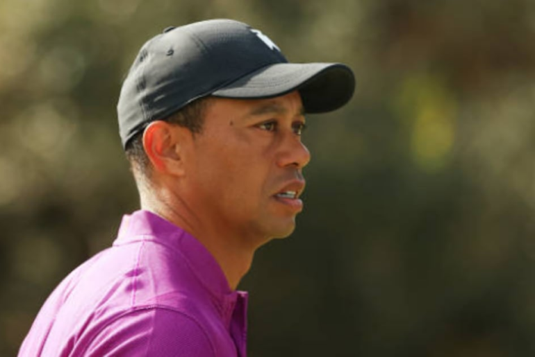 Tiger chipping, putting, says recovery from disc surgery 'slow'