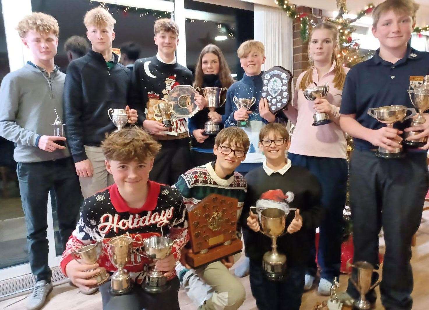 Winners at Canterbury Golf Club's junior prizegiving, standing (from left): Ted Rich, Will Downs, Harry Andrews, Georgina Carlotti, Louis Garvey, Christina Carlotti and Ben Holcroft. Kneeling: Callum Ferrett, Emilio Lockhart and Caleb Twyman