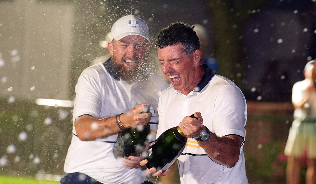 Rory McIlroy and Shane Lowry of Team Europe celebrate after winning the Ryder Cup outright, beating the United States 15-13 on day three of the 2025 Ryder Cup at the Bethpage Black Course, Farmingdale, New York. Picture date: Sunday September 28, 2025.