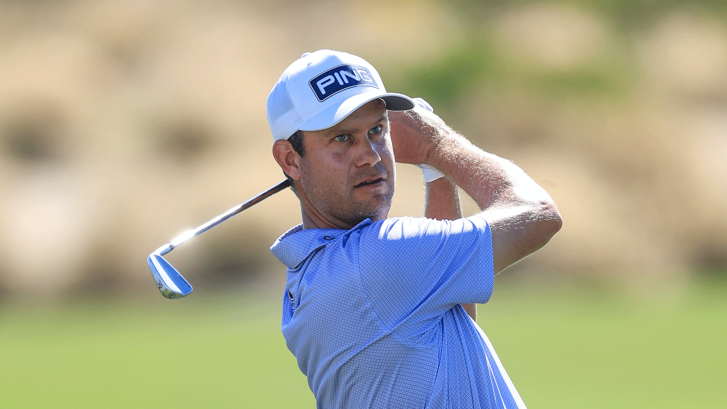 Harris English hits an iron shot during the 2025 Hero World Challenge