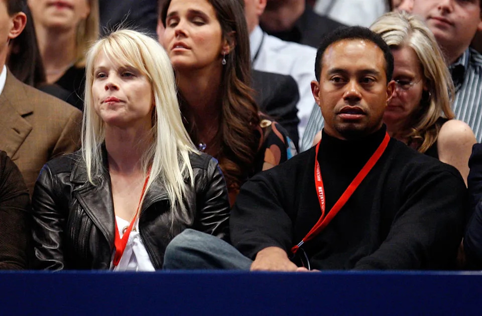 NEW YORK – MARCH 10: Tiger Woods and wife Elin watch as Pete Sampras and Roger Federer of Switzerland play an exhibition match on March 10, 2008 at Madison Square Garden in New York City. (Photo by Nick Laham/Getty Images)