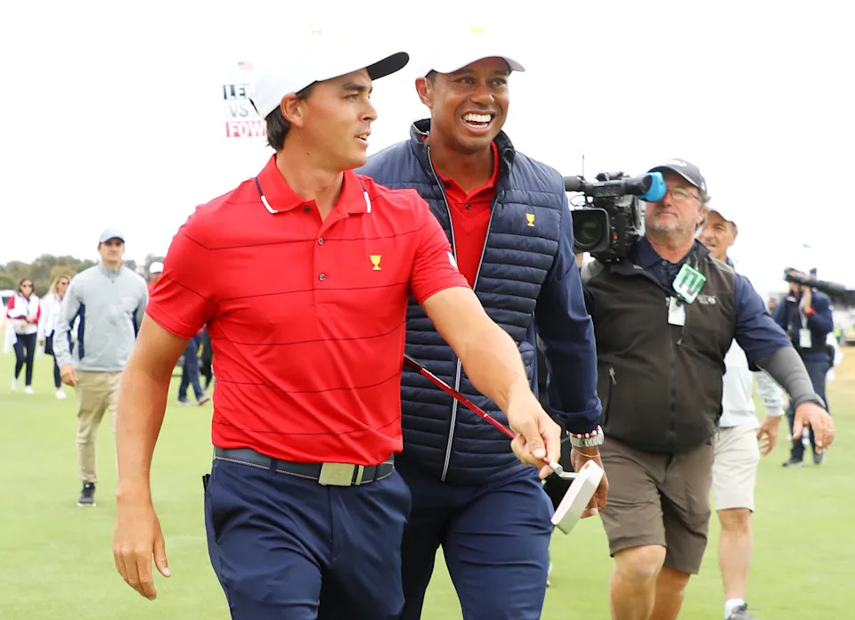 Tiger Woods and Rickie Fowler team celebrate after they won the Presidents Cup 16-14 during Sunday Singles matches on day four of the 2019 Presidents Cup at Royal Melbourne Golf Course on December 15, 2019 in Melbourne, Australia. (Photo by Warren Little/Getty Images)