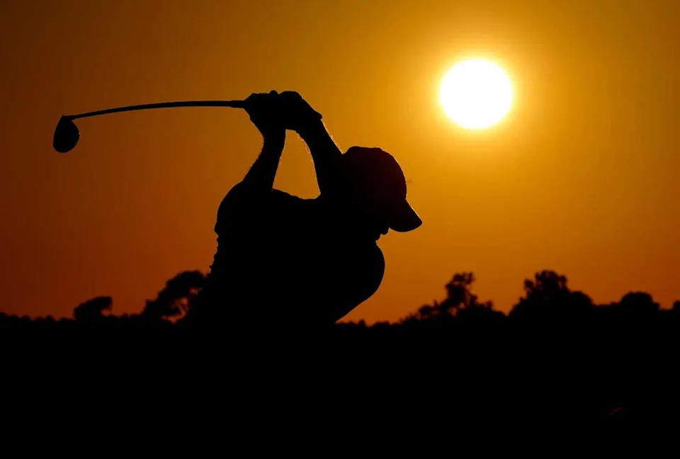 Tiger Woods plays his shot from the 10th tee as the sun sets during the second round of the Masters Tournament at Augusta National Golf Club on Nov. 13, 2020.Rob Schumacher &sol; USA TODAY NETWORK via Imagn Images