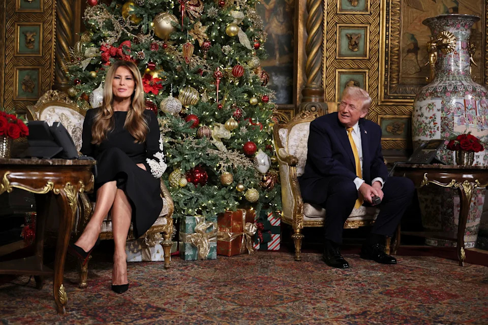 U.S. President Donald Trump and first lady Melania Trump participate in NORAD Santa tracker phone calls, on Christmas Eve, from the Mar-a-lago club in Palm Beach, Florida, U.S., December 24, 2025.
