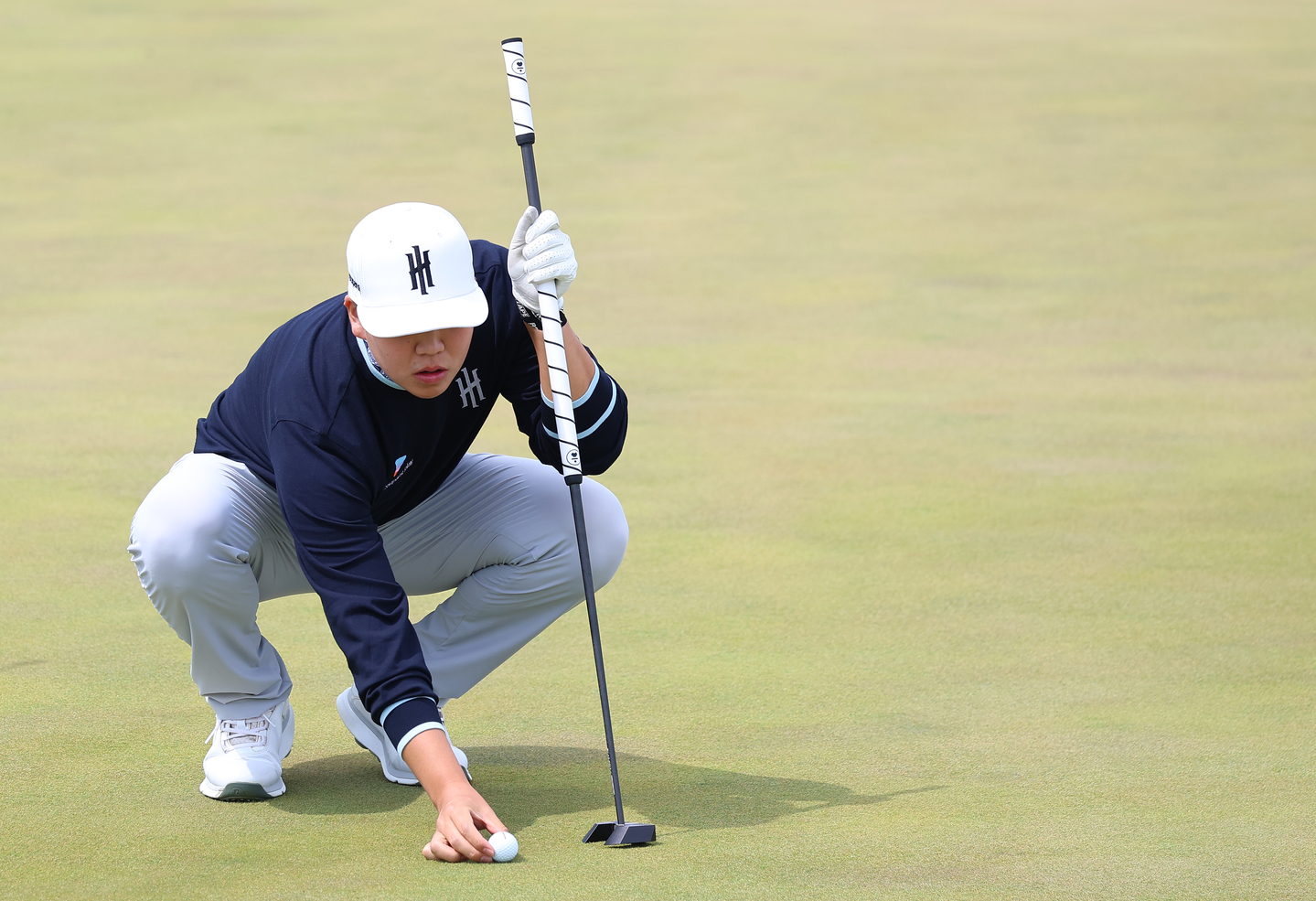 Jang Yu-bin of Korea inspects a hole during the first round of LIV Golf Korea at Jack Nicklaus Golf Club Korea in Incheon on May 2. [YONHAP]