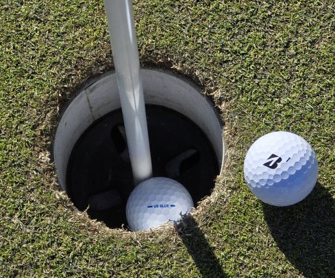 VS Prototype golf ball in the hole