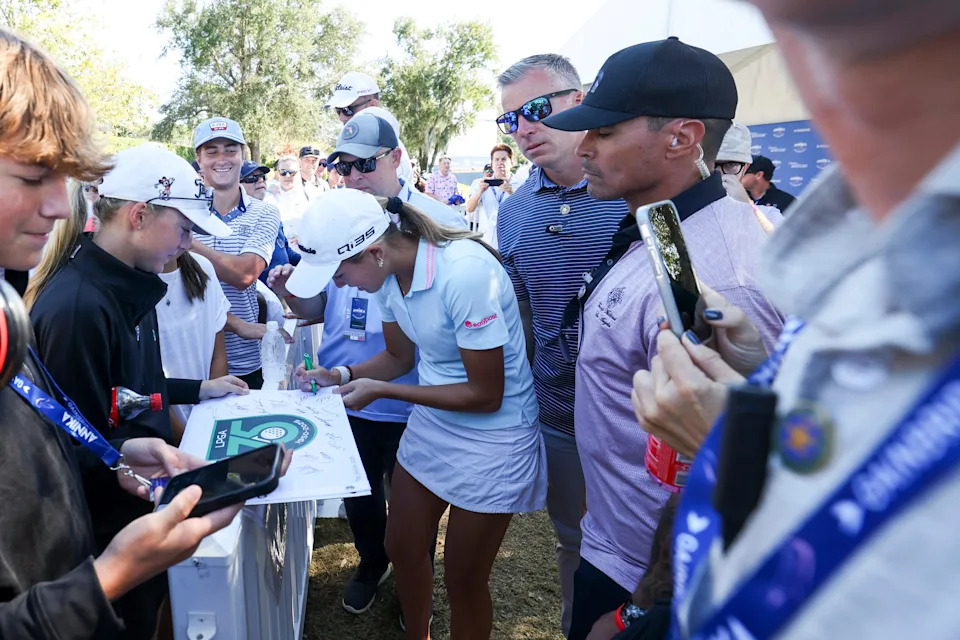 Nov 14, 2025; Belleair, Florida, USA; Kai Trump signs autographs after the second round of The ANNIKA golf tournament at Pelican Golf Club. Mandatory Credit: Nathan Ray Seebeck-Imagn Images