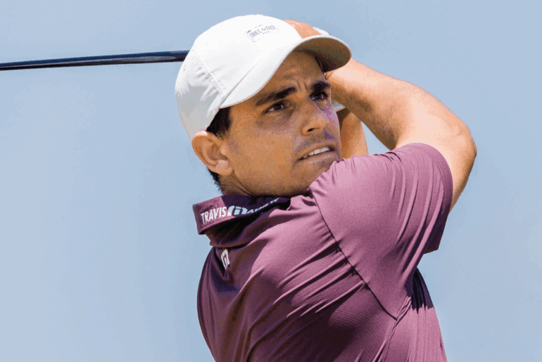 Emilio Gonzalez Ramirez tees off during a round of golf.
